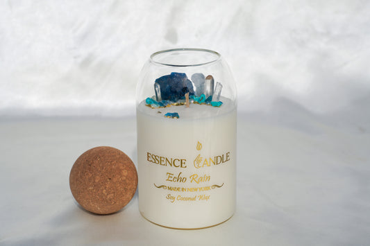 Echo Rain 27oz hand-poured candle in an elegant glass jar with cork lid, crafted from eco-friendly soy and coconut wax, offering a luxury gift experience and long burn time.
