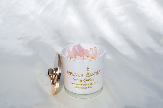 Ivory Spring 18.5oz hand-poured candle in a frosted glass jar with gold stainless steel lid, crafted from eco-friendly soy and coconut wax, offering a luxury gift experience and long burn time.