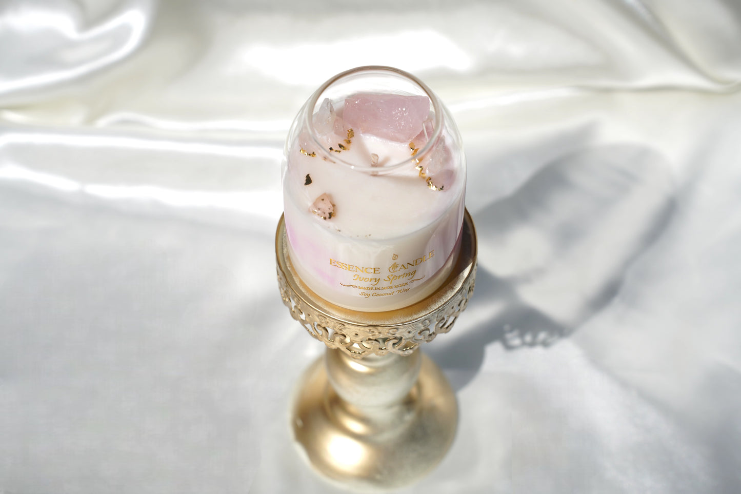 Ivory Spring crystal candle with ylang ylang, rose quartz, and clear quartz. 17 oz size, artisan poured in New York, crafted with soy coconut wax for extended burn.