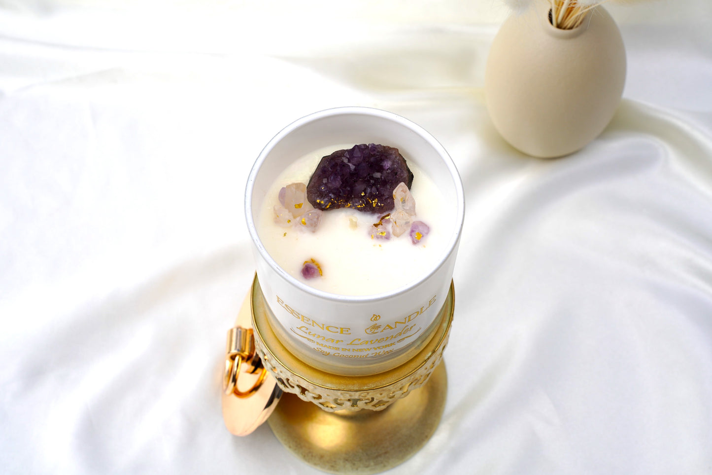 Elegant Lunar Lavender crystal candle in 18.5oz jar with amethyst, clear quartz, and gold detailing, artisan crafted in New York.