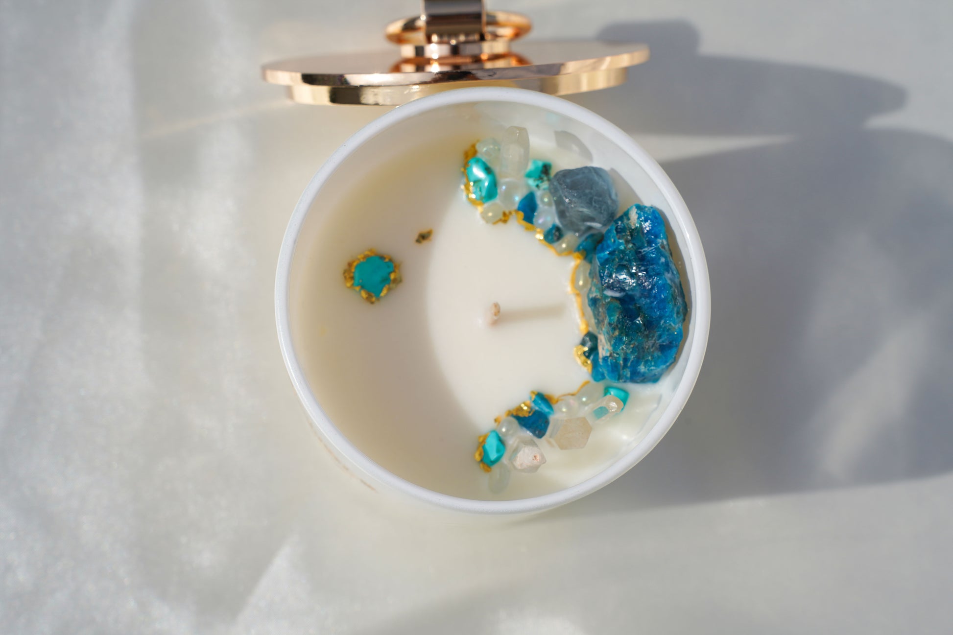 Luxury hand-poured Echo Rain candle, 18.5oz frosted glass jar with gold stainless steel lid, made with eco-friendly soy and coconut wax for a clean, long burn — the perfect elegant gift.