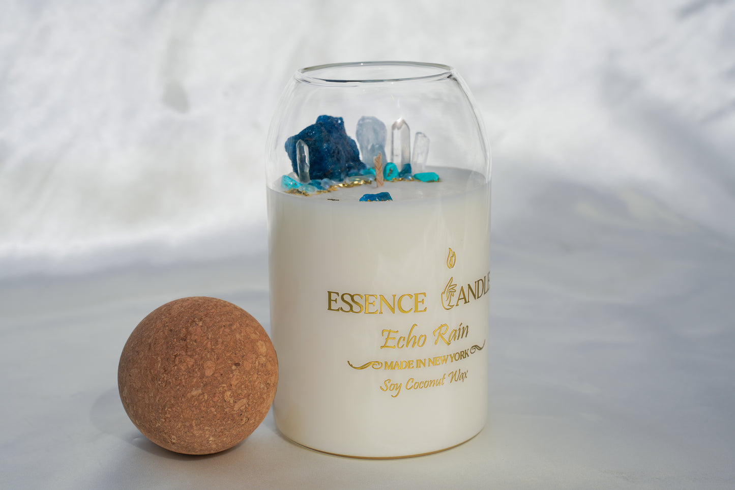 Luxury hand-poured Echo Rain candle, 27oz glass jar with natural cork lid, made with eco-friendly soy and coconut wax for a clean, long burn — the perfect refined gift.