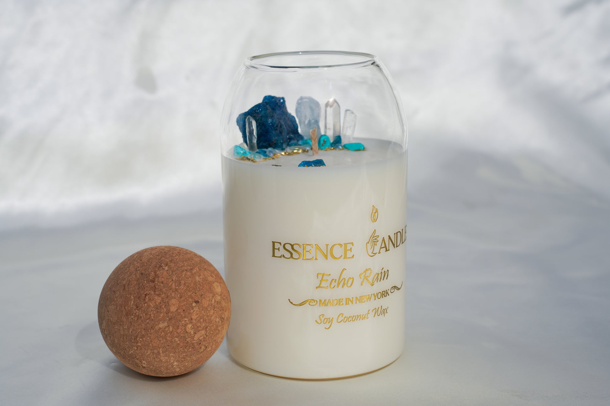 Luxury hand-poured Echo Rain candle, 27oz glass jar with natural cork lid, made with eco-friendly soy and coconut wax for a clean, long burn — the perfect refined gift.