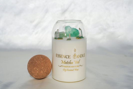 Matcha Veil 27oz hand-poured candle in an elegant glass jar with cork lid, crafted from eco-friendly soy and coconut wax, offering a luxury gift experience and long burn time.