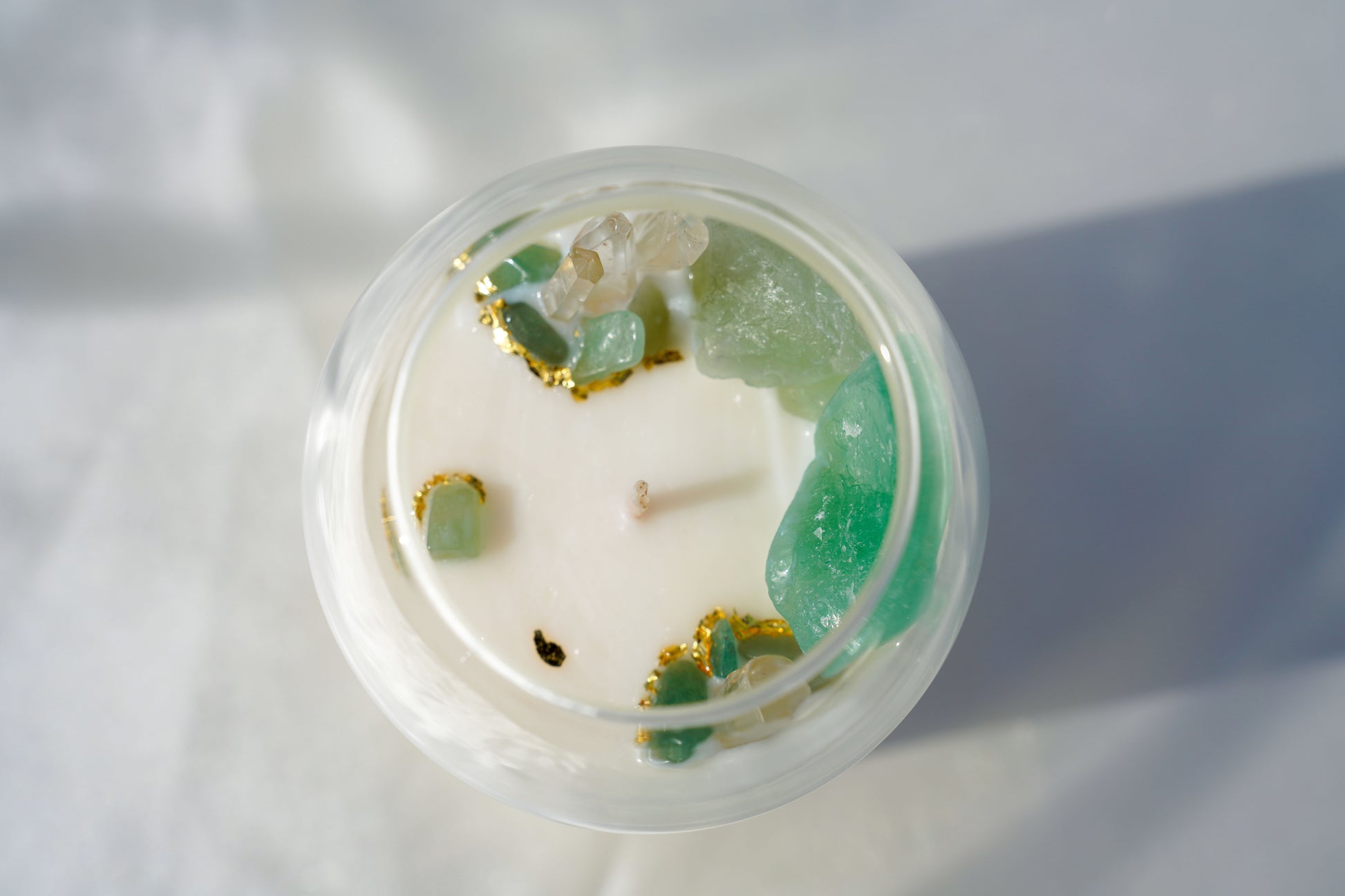 Matcha Veil 27oz hand-poured candle in an elegant glass jar with cork lid, crafted from eco-friendly soy and coconut wax, offering a luxury gift experience and long burn time.