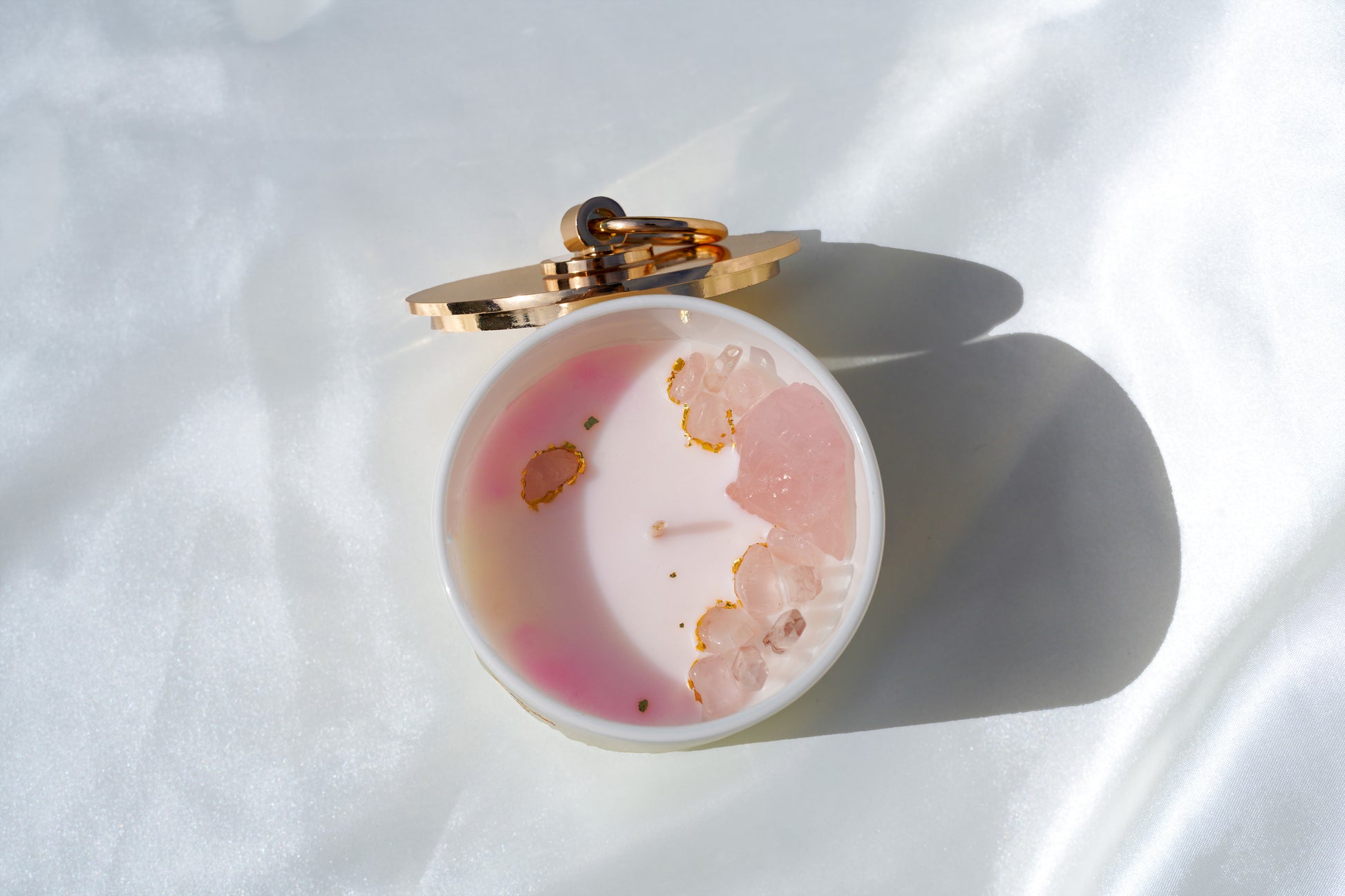 Luxury hand-poured Ivory Spring candle, 18.5oz frosted glass jar with gold stainless steel lid, made with eco-friendly soy and coconut wax for a clean, long burn — the perfect elegant gift.