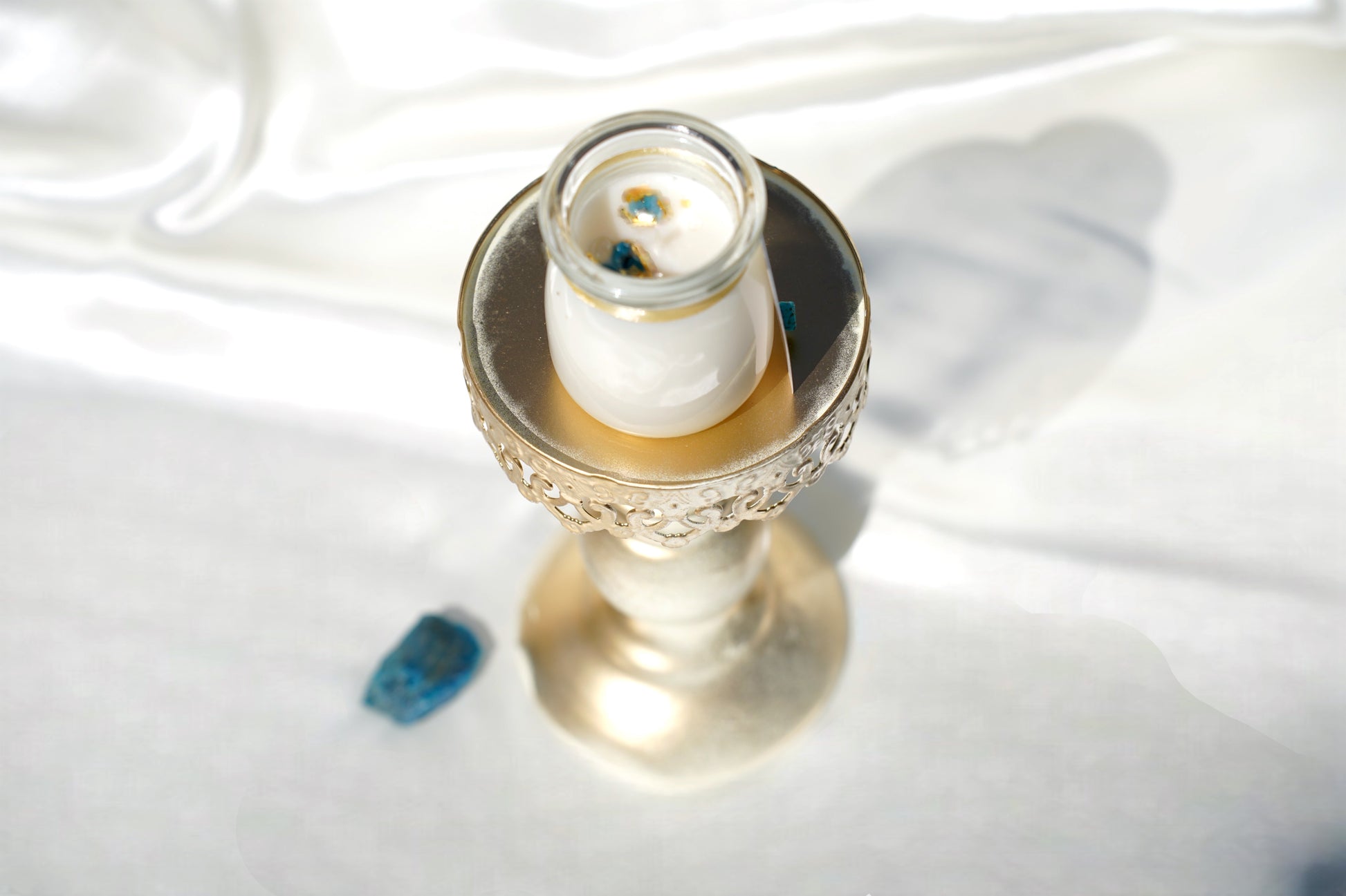 Eco-friendly Echo Rain 4 oz candle with turquoise howlite and rainbow aura quartz crystals, soy coconut wax blend, handmade in New York, extended burn time.