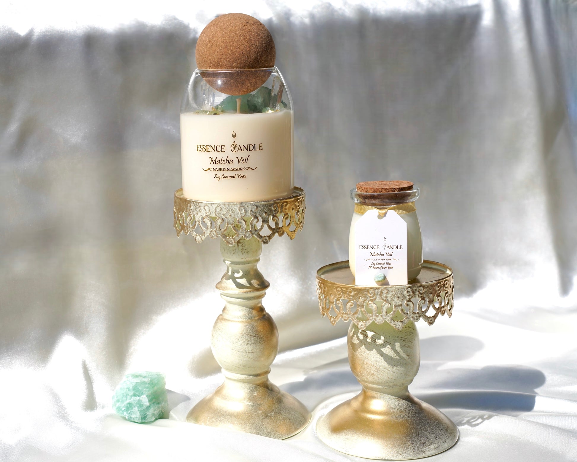 Green fluorite and aventurine crystal details inside Matcha Veil candle, healing energy crystal candle with clear quartz and gold accents, luxury home fragrance.