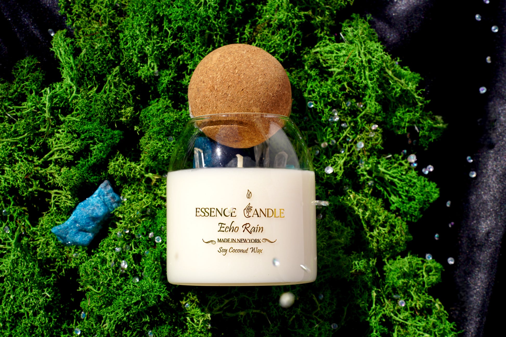 Hand-poured Echo Rain rainforest candle, 4 oz size with turquoise howlite, rainbow aura quartz, and shimmering gold flakes, crafted in New York with soy coconut wax for an extended burn