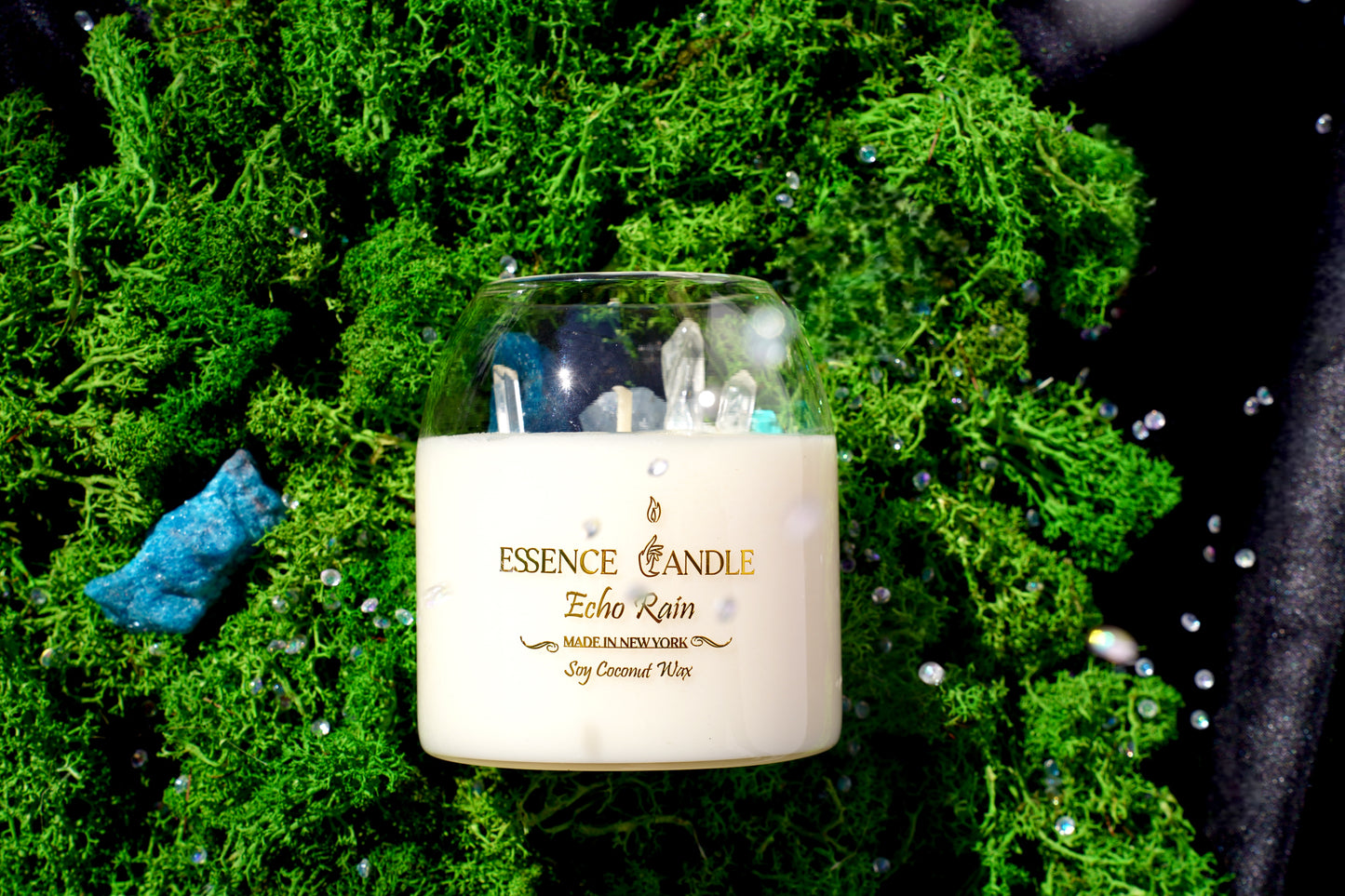 Luxury Echo Rain rainforest candle, 17 oz jar with obsidian, amazonite, and clear quartz. Hand-poured in New York with eco soy coconut wax, offering double the burn time.