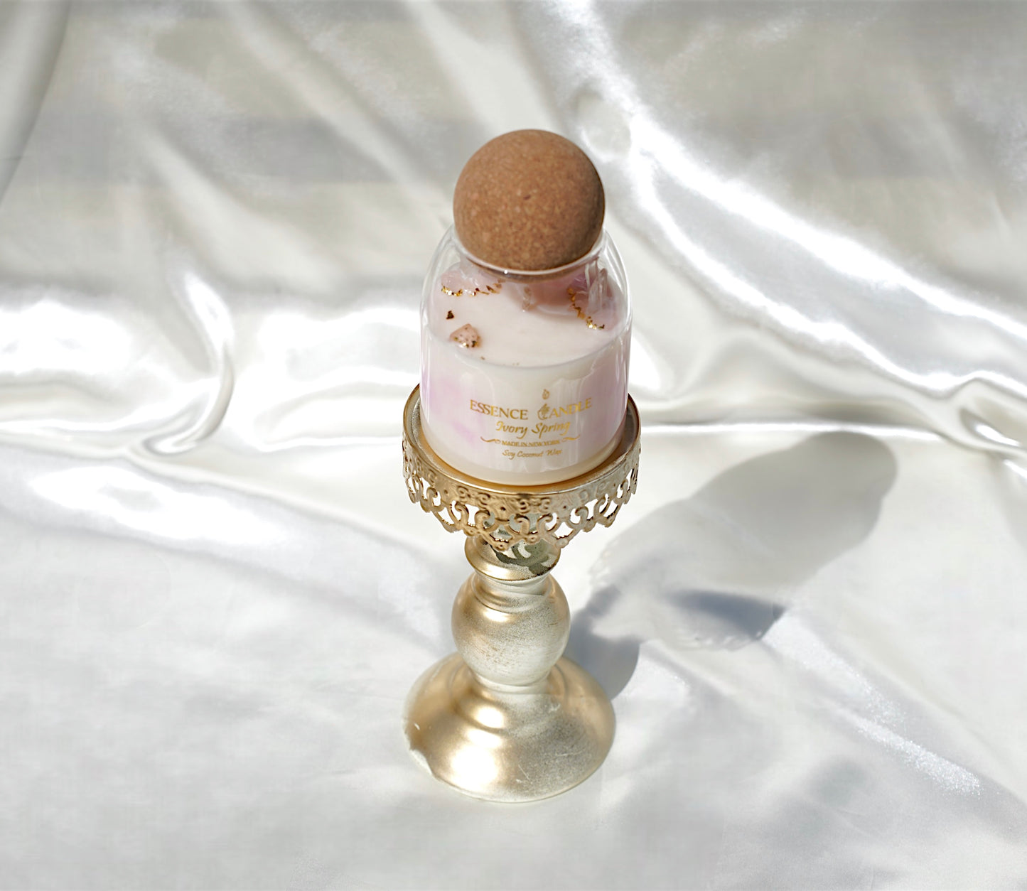 Eco-luxury Ivory Spring candle, 17 oz jar with ylang ylang, rose quartz, and clear quartz. Handmade in New York with soy coconut wax, offering a burn that lasts twice as long. Perfect gift.