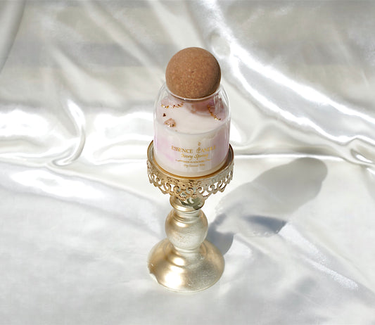 Eco-luxury Ivory Spring candle, 17 oz jar with ylang ylang, rose quartz, and clear quartz. Handmade in New York with soy coconut wax, offering a burn that lasts twice as long. Perfect gift.
