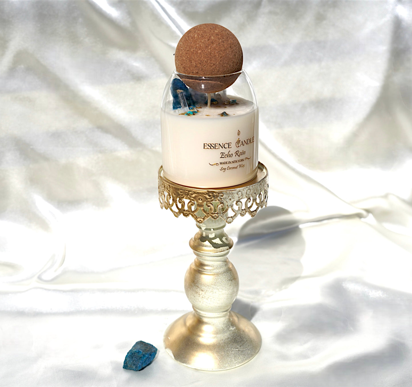 Echo Rain luxury candle with rainforest fragrance, obsidian, amazonite, and clear quartz in a 17 oz jar. Handmade in New York with soy coconut wax, lasting twice as long.